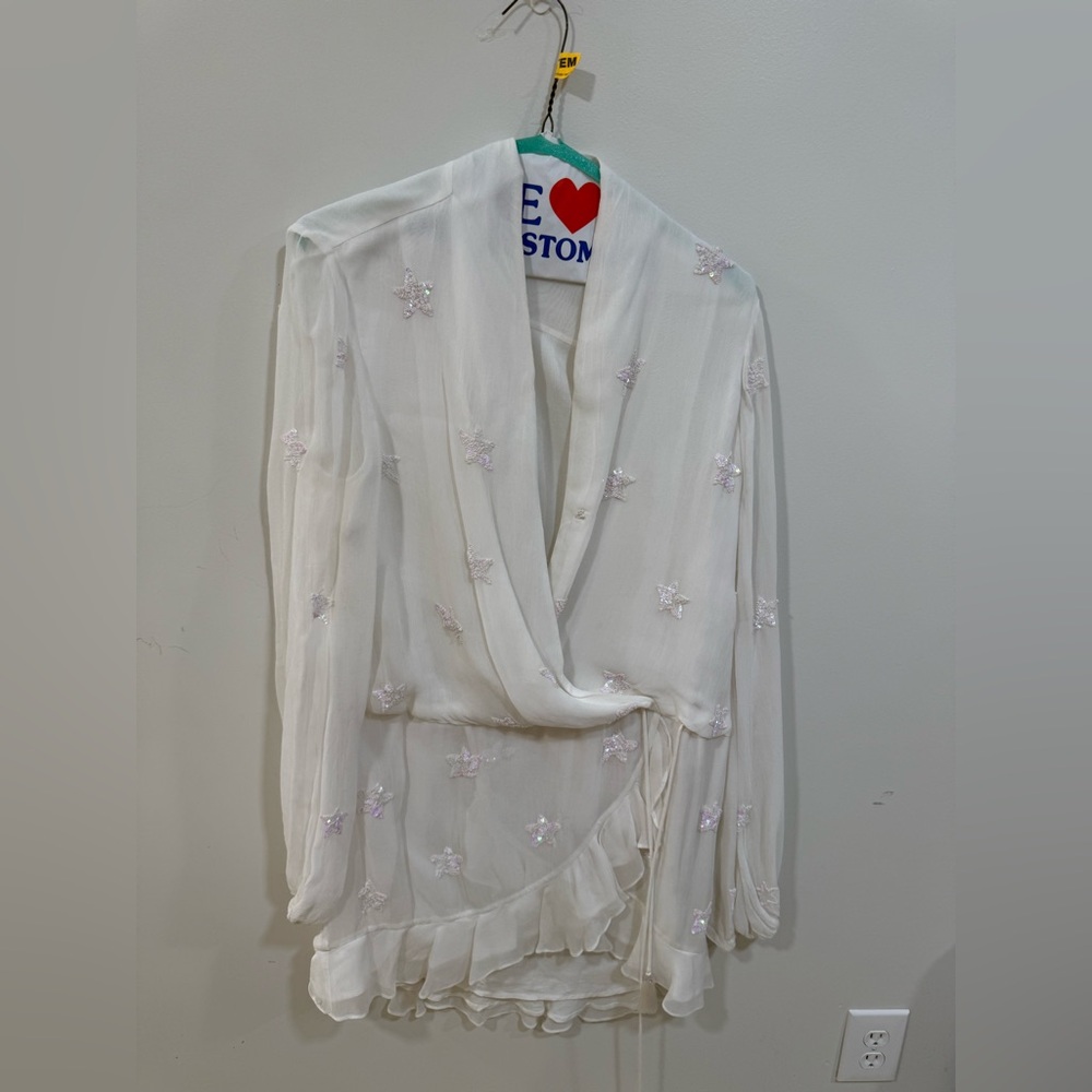 Rococo Sand Cream and Orange Label Detail